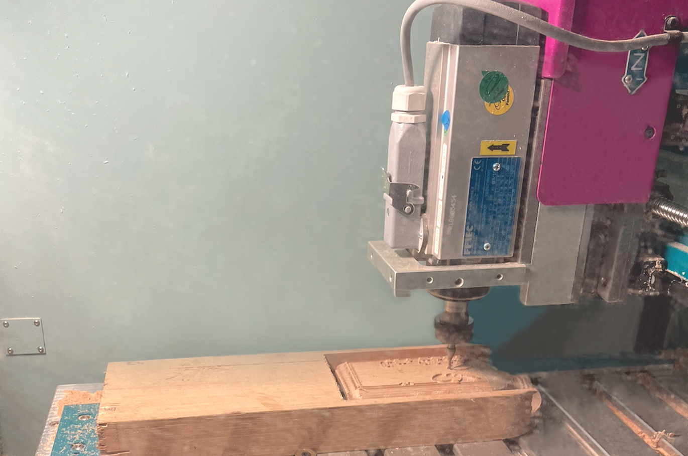 CNC Machine milling a block of wood